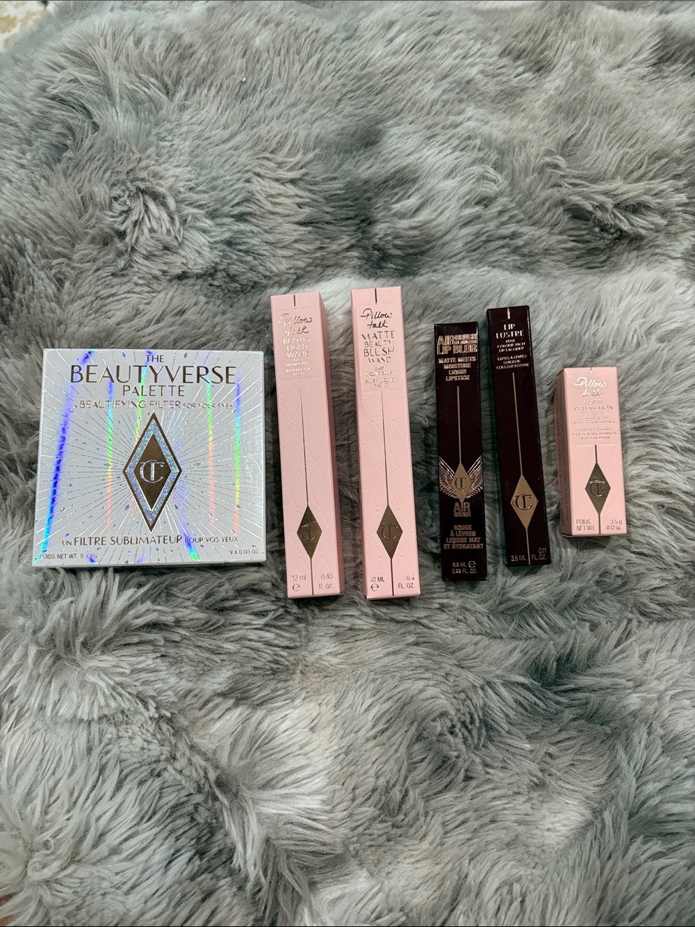 Charlotte Tilbury Eyeshadow palette, lip products, highlighter and blush